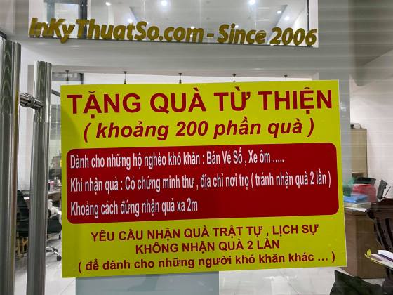In banner dán kính thông báo tặng quà từ thiện tại tòa nhà MBN Tower - Công ty TNHH In Kỹ Thuật Số 365 Lê Quang Định, phường 5, Bình Thạnh, HCM